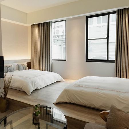 Tianli Hotel Тайнань Экстерьер фото