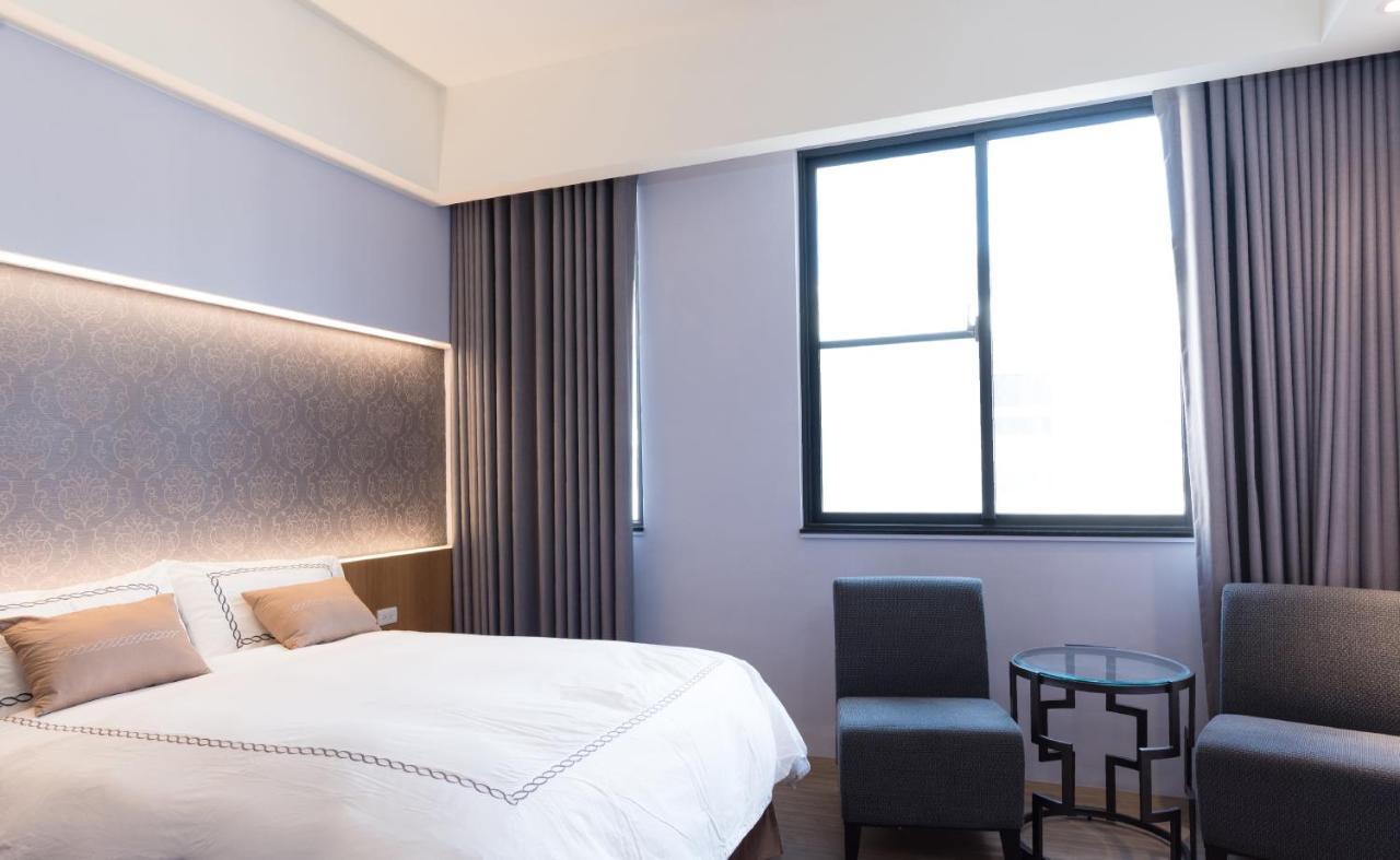 Tianli Hotel Тайнань Экстерьер фото
