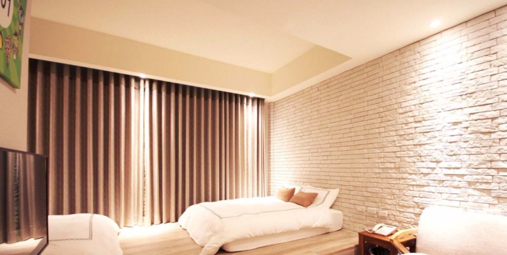Tianli Hotel Тайнань Экстерьер фото