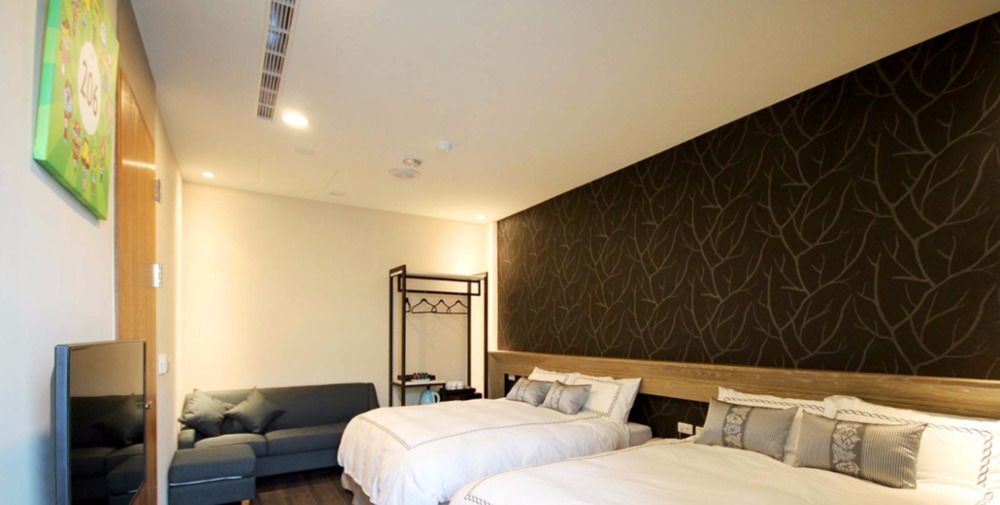 Tianli Hotel Тайнань Экстерьер фото