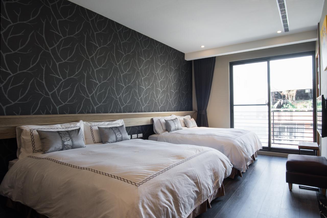 Tianli Hotel Тайнань Экстерьер фото