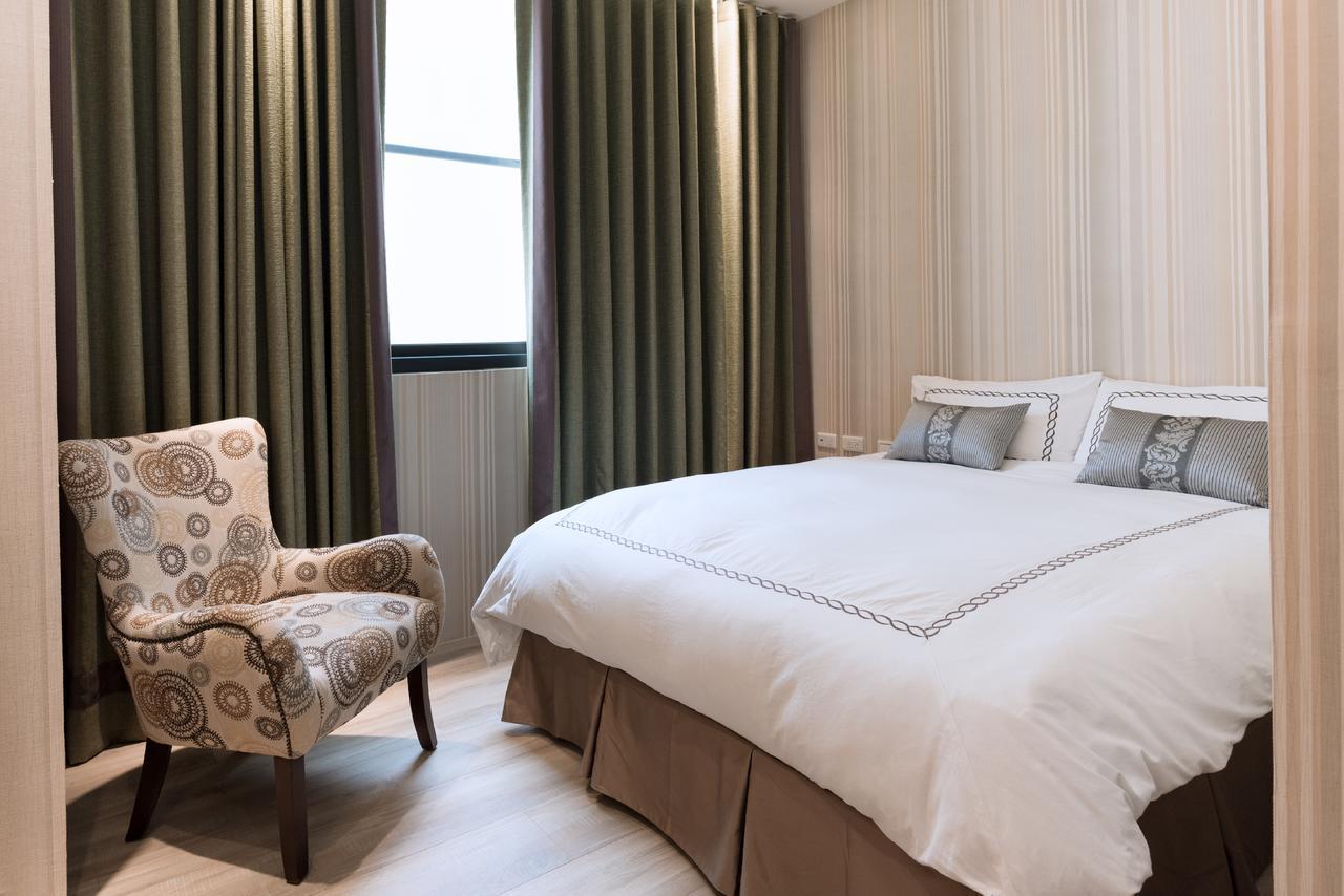 Tianli Hotel Тайнань Экстерьер фото