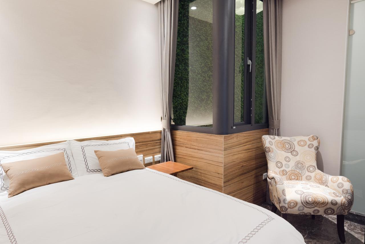 Tianli Hotel Тайнань Экстерьер фото