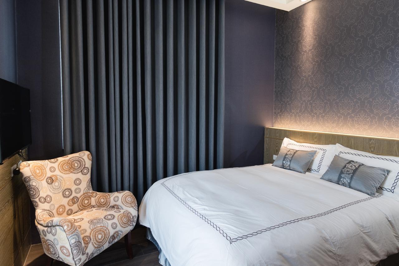 Tianli Hotel Тайнань Экстерьер фото