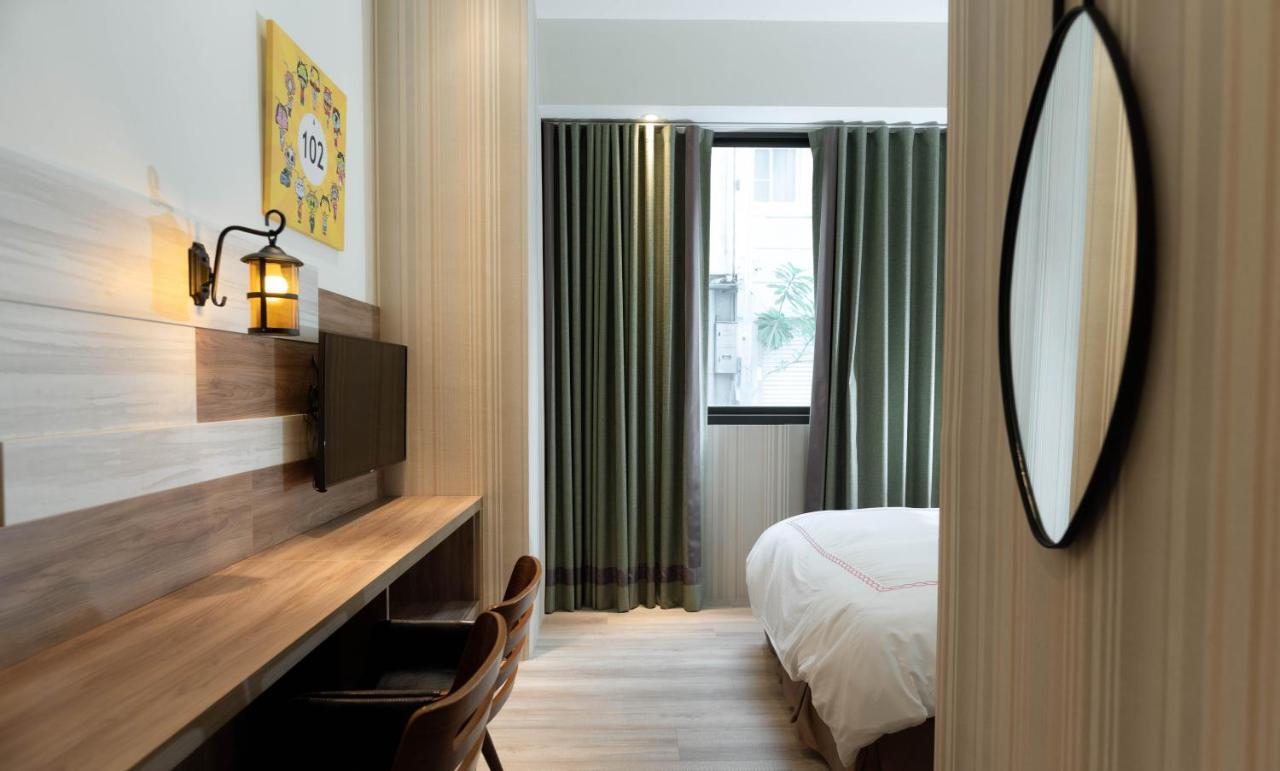 Tianli Hotel Тайнань Экстерьер фото