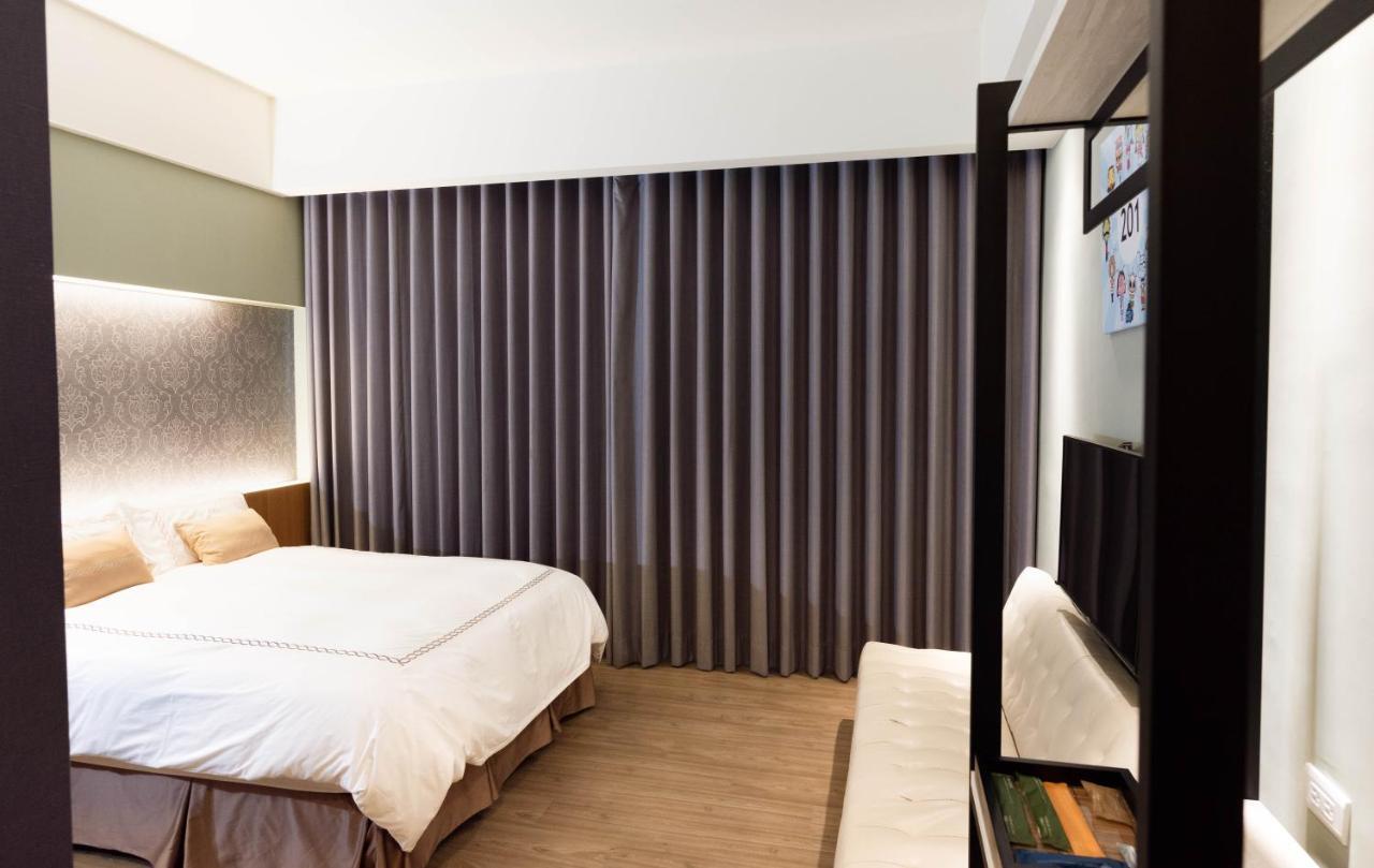 Tianli Hotel Тайнань Экстерьер фото