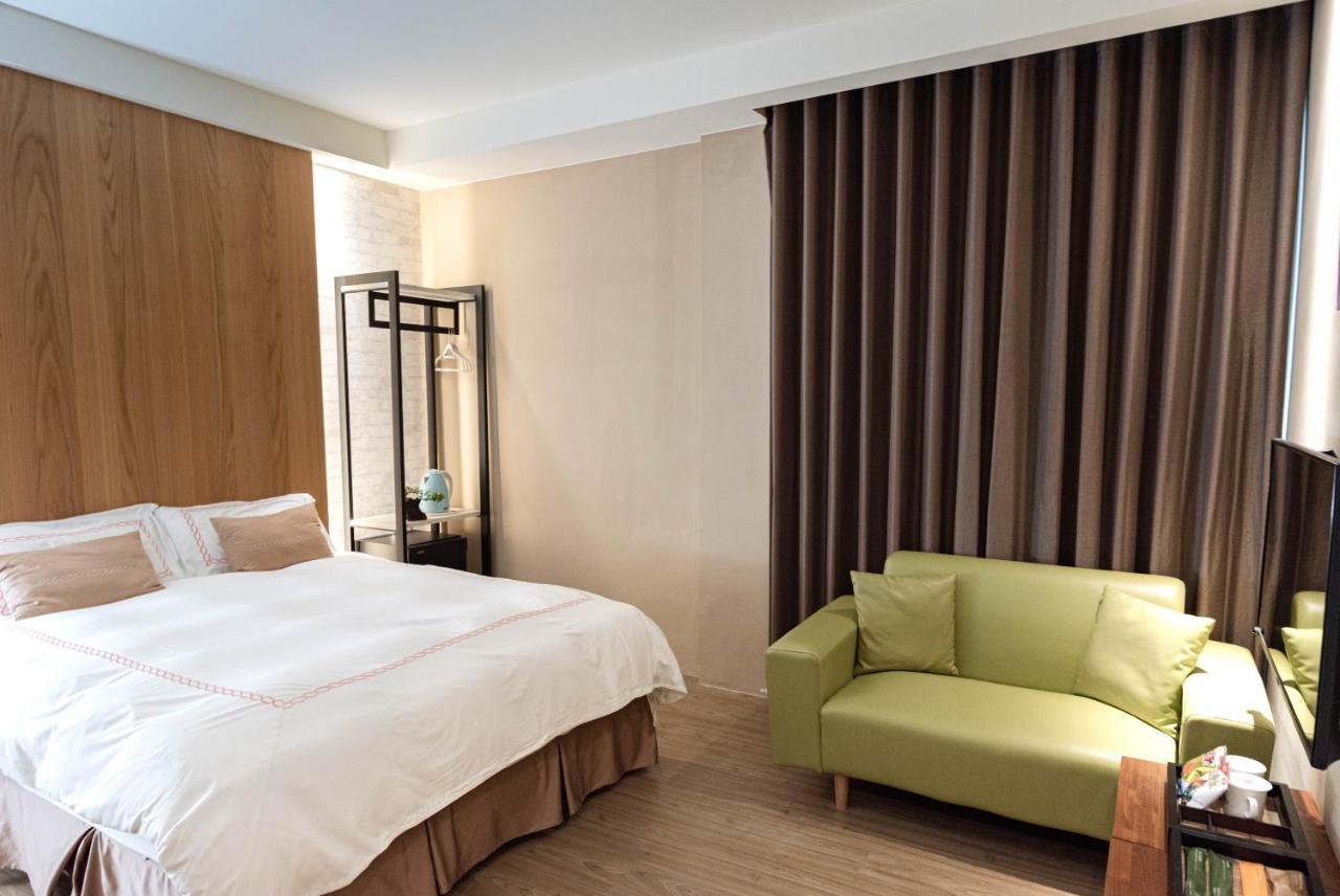 Tianli Hotel Тайнань Экстерьер фото