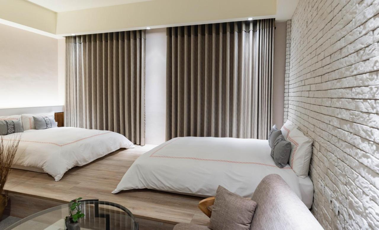 Tianli Hotel Тайнань Экстерьер фото