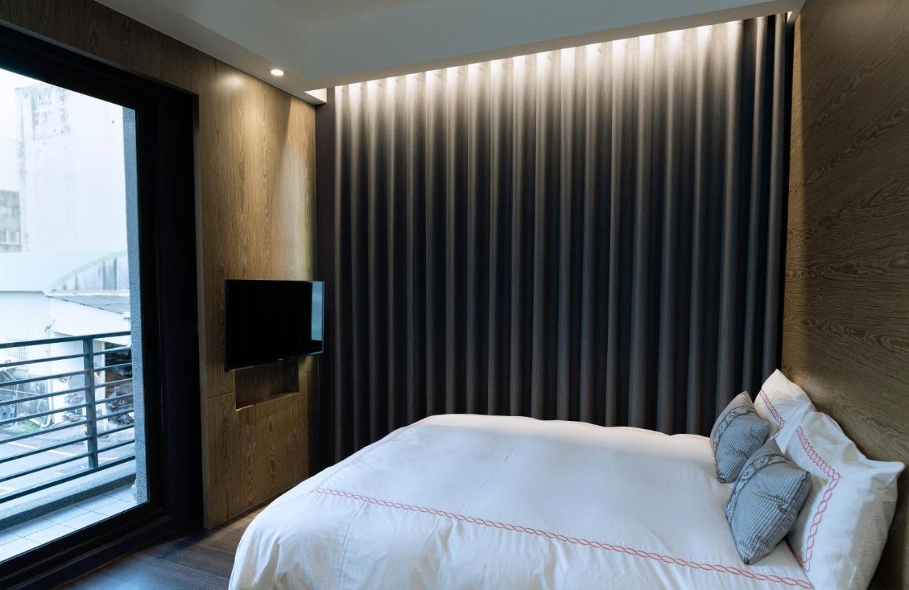 Tianli Hotel Тайнань Экстерьер фото
