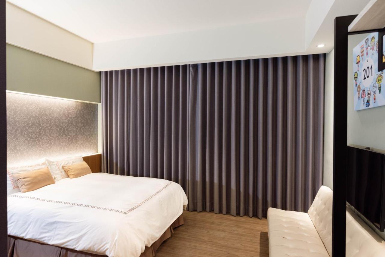 Tianli Hotel Тайнань Экстерьер фото