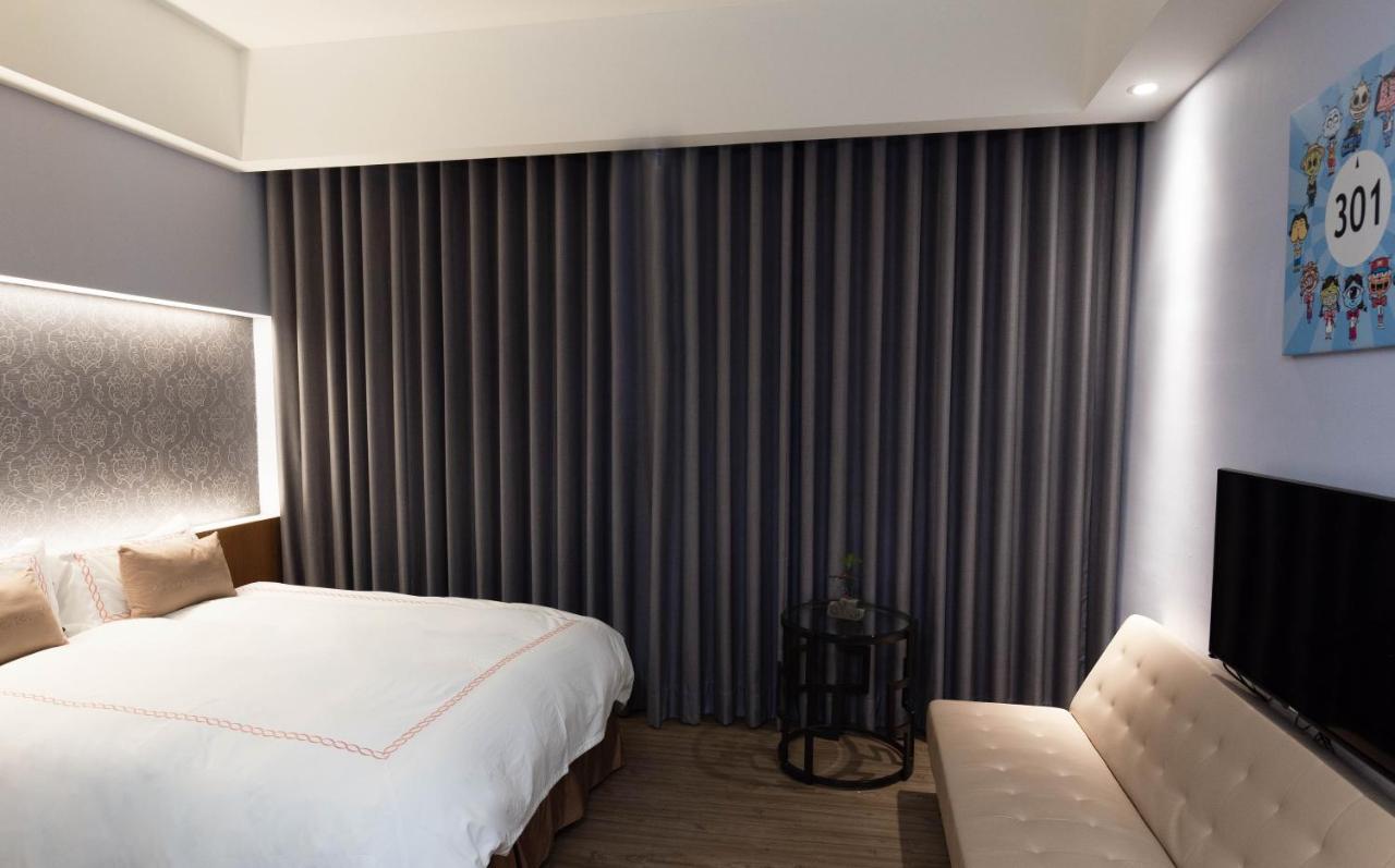 Tianli Hotel Тайнань Экстерьер фото